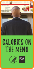 Man looking at menu board with calories featured on the menu