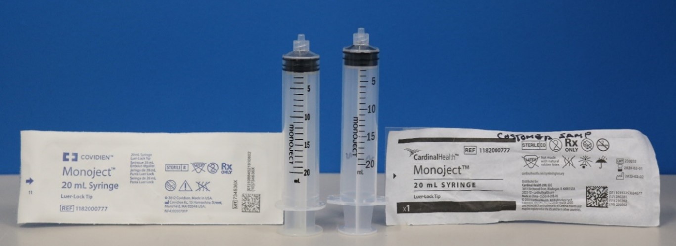 Example showing the 20mL Covidien Monoject syringe on the left has different dimensions than the 20mL Cardinal Health Monoject syringe on the right.