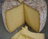 "Walton Umber is a simple tomme-style cheese, basket weave rind, aged 3-6 months, good melting properties, fruity and buttery young, notes of rosted vegetables and hazelnuts mature. Natural rind, unpasteurized cows' milk, 4 lbs."