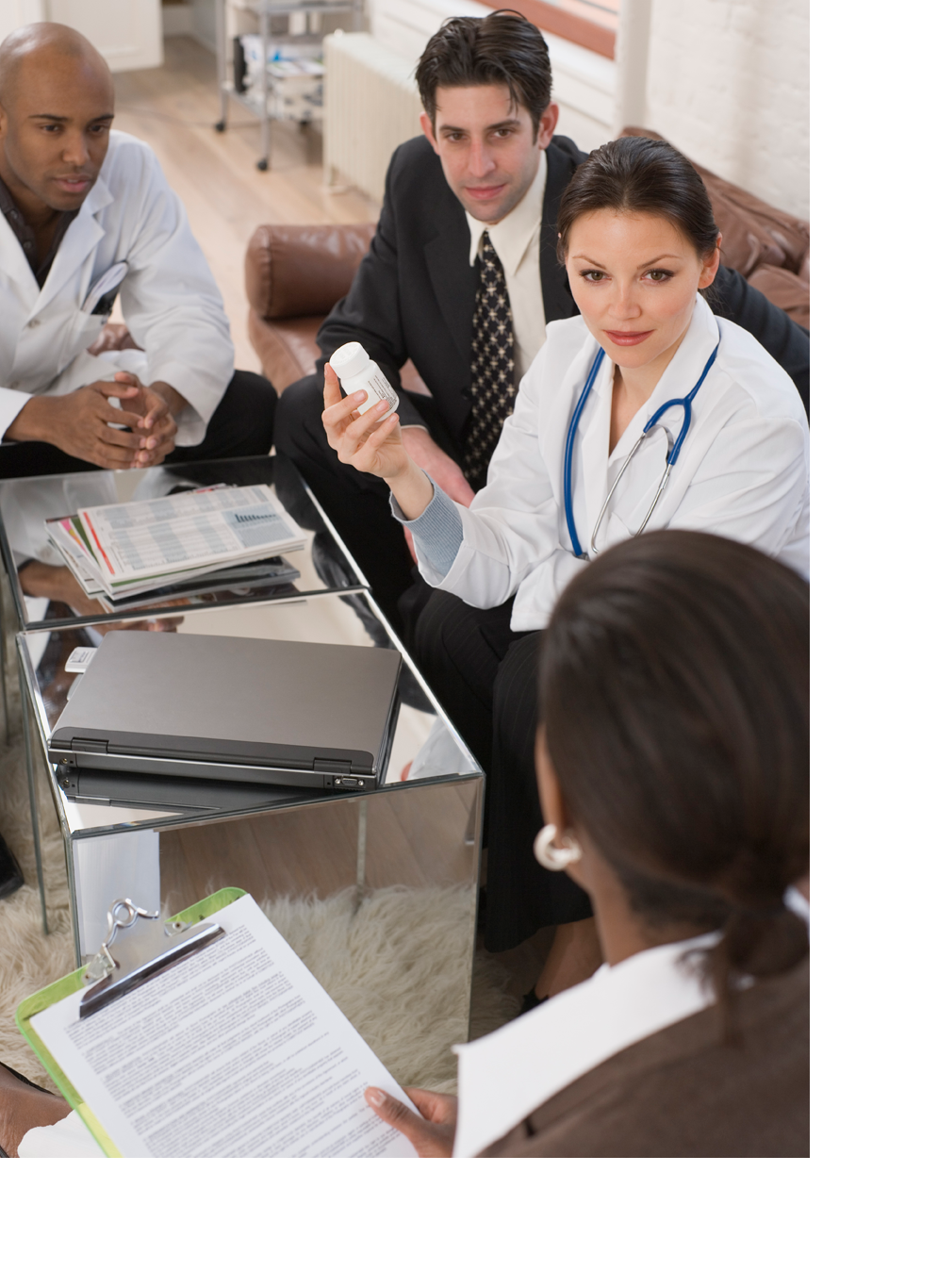 Photo of business people meeting with doctors discussing drug contents.