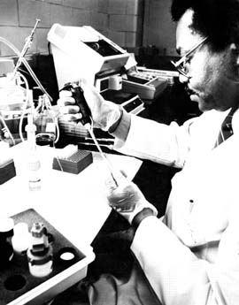 Man sitting at a laboratory bench