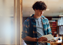 Teen reading book