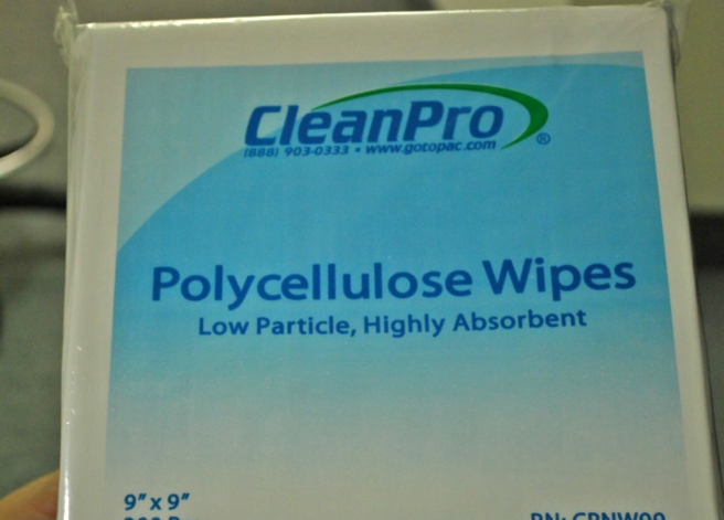 Non-sterile wipes being used to disinfect the cleanroom. Sterile wipes should be used.