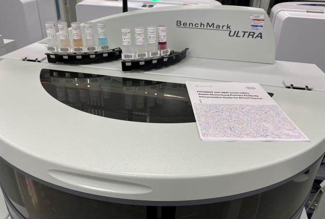 PATHWAY anti-HER2 (4B5) Antibody test kit on top of the machine that is used to process the samples.