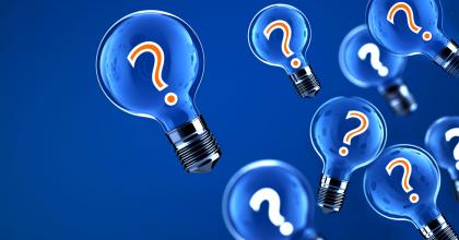 Graphic of several light bulbs with question marks inside floating on a blue background