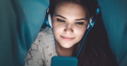 Teen looking at phone