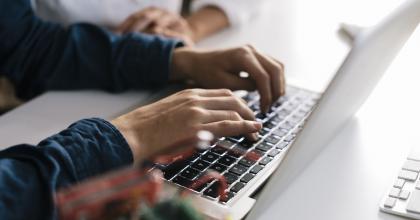 administrative professional at computer