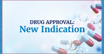 A decorative image with a blue border and the words 'DRUG APPROVAL: New Indication' in dark blue text. Red and white capsules and clear bubbles float in the background.