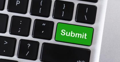 Green Submit button on a computer keyboard