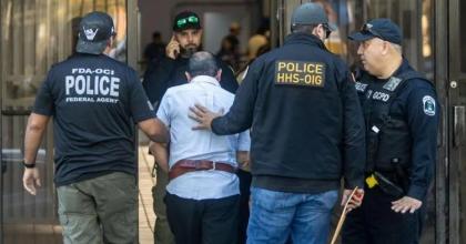 OCI photo of agents arresting 