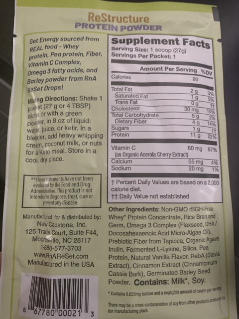 Photo 3/back: “Corrected back label with “Contains Milk, Soy.” statement added on lower right corner”