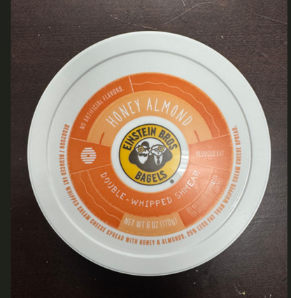 Image of label on lid, Einstein Bros. Bagels, Honey Almond Double Whipped Shmear NET WT 6 OZ.
