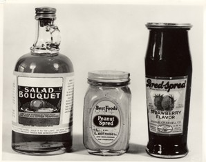 3 different size jars containing liquid
