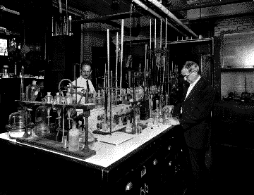 Two men working at a laboratory bench